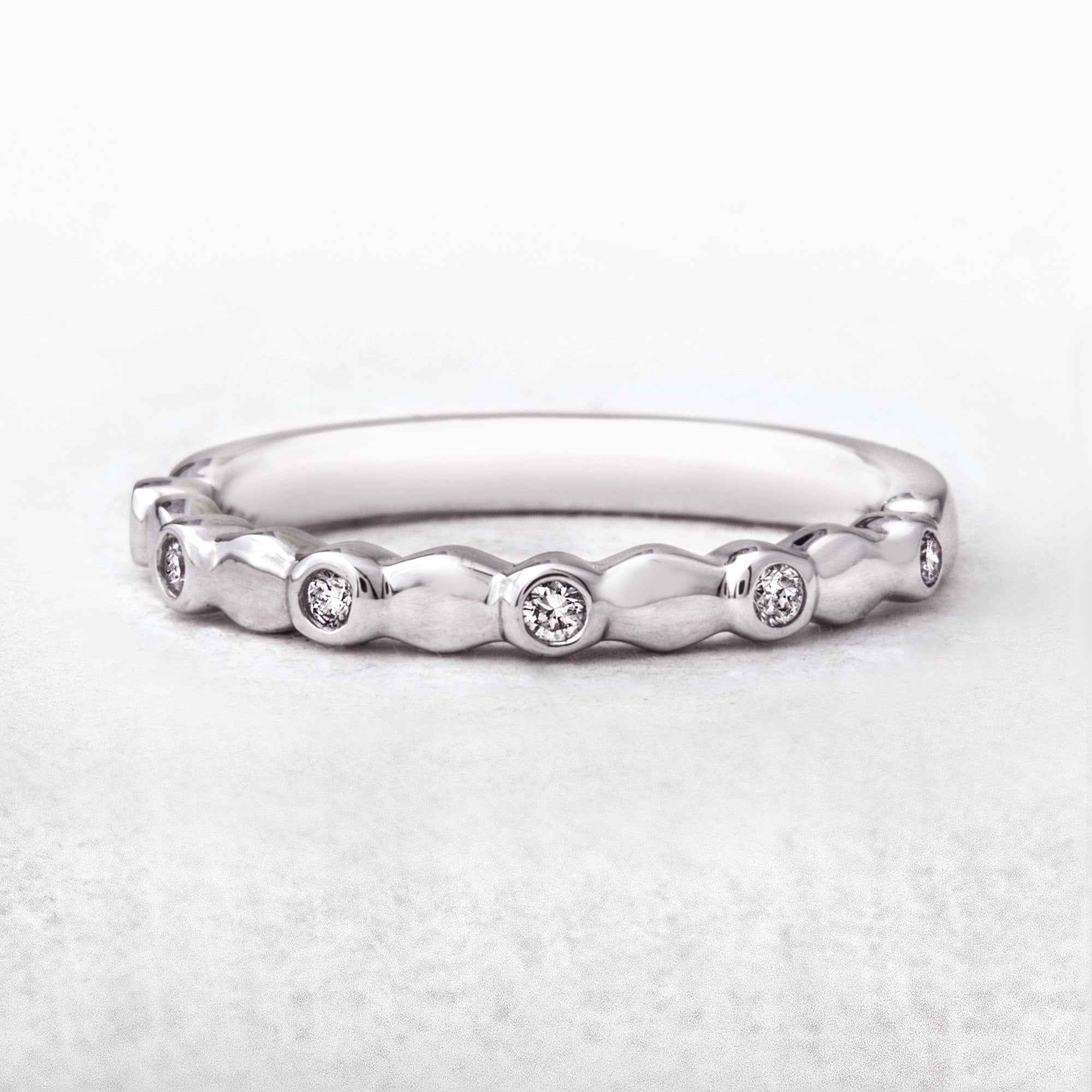 0.06ct 2mm Random Bezel Set Natural Diamond Wedding Band In 18ct White Gold