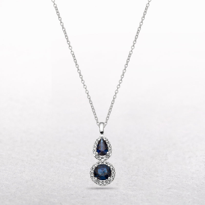 0.12ct Sapphire Pear and Round Sapphire & Diamond Pendant in 9ct White Gold