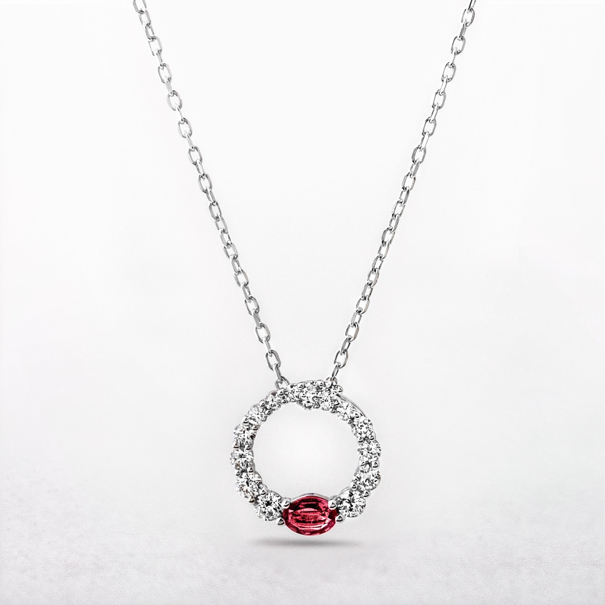 0.20ct Oval Cut Ruby and 0.32ct Diamond Set Pendant in 18ct White Gold