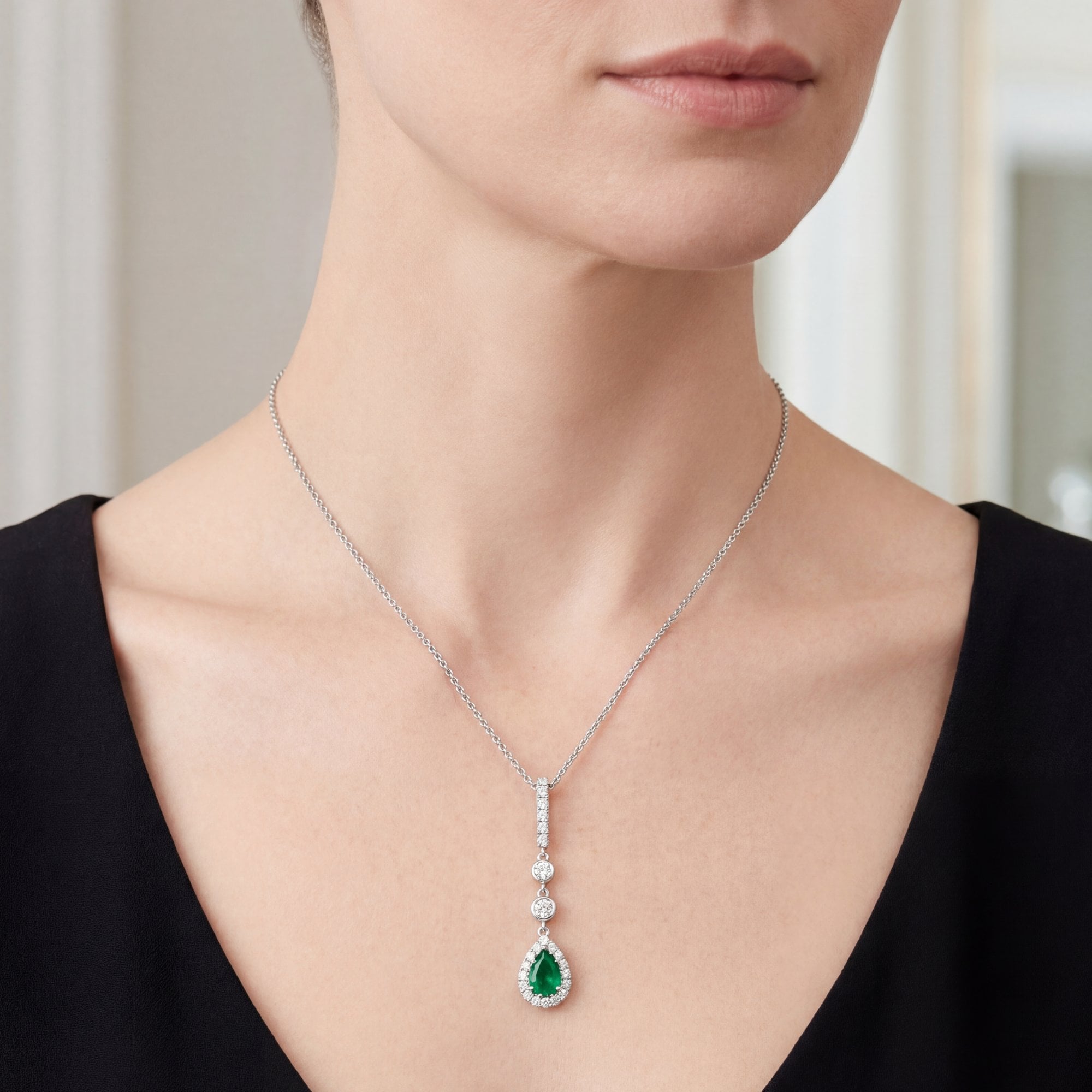 0.22ct Emerald & 0.23ct Natural Diamond Drop Pendant in 18ct White Gold