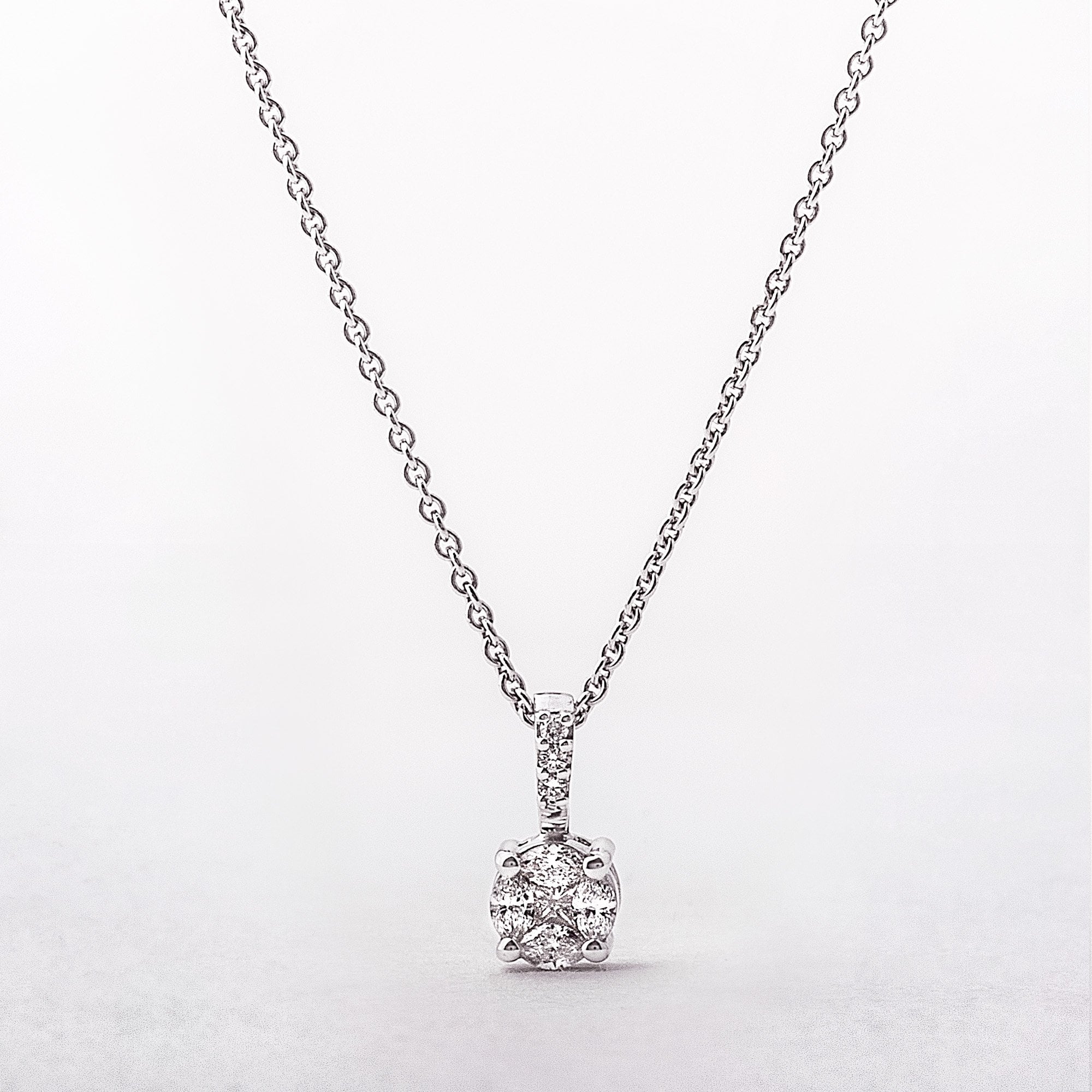 0.32ct Natural Diamond 5.3mm Invisible Set Round Pendant in 18ct White Gold
