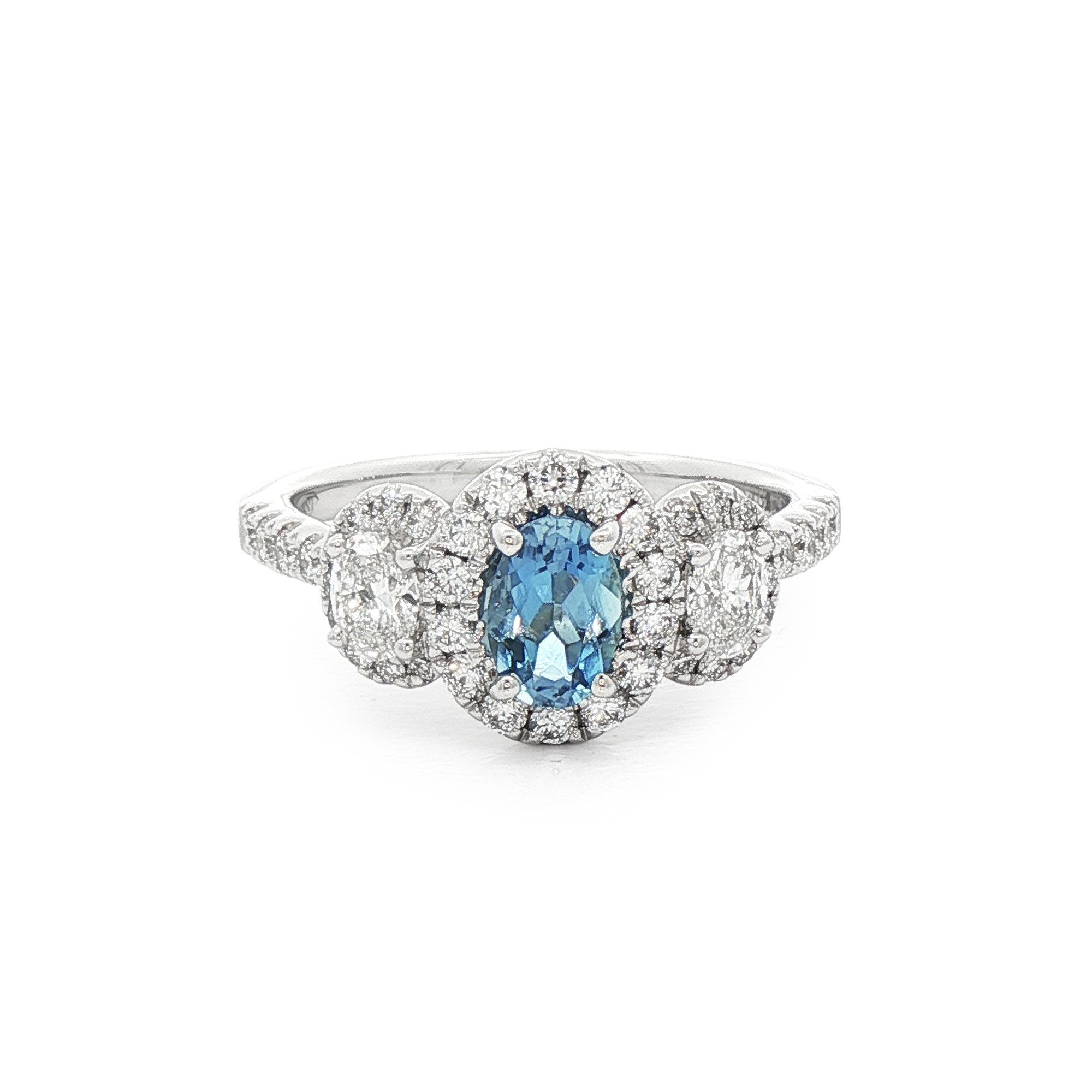 0.40ct Oval Aqua Marine & 0.70ct Natural Oval Diamond Halo Three Stone in 18ct White Gold