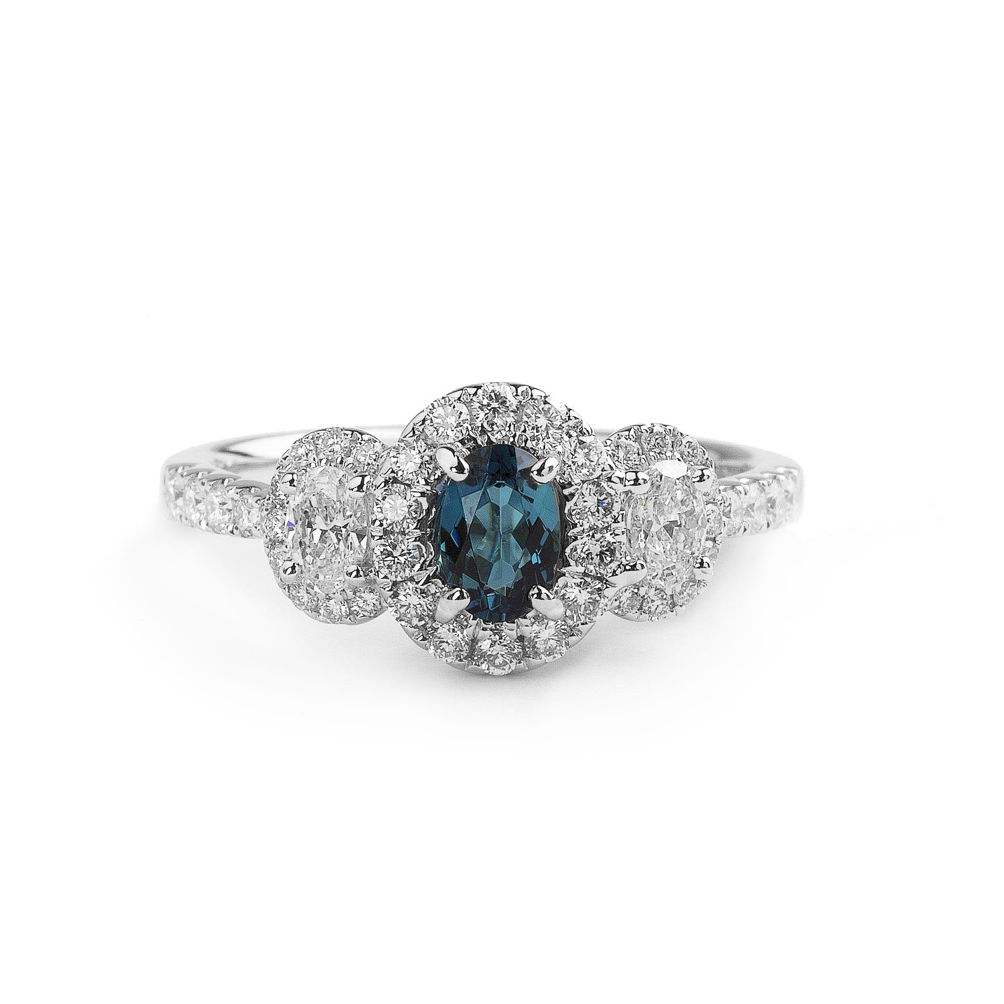 0.42ct Oval Green Tourmaline and Natural Diamond Halo Style Three Stone Ring in 18ct White Gold