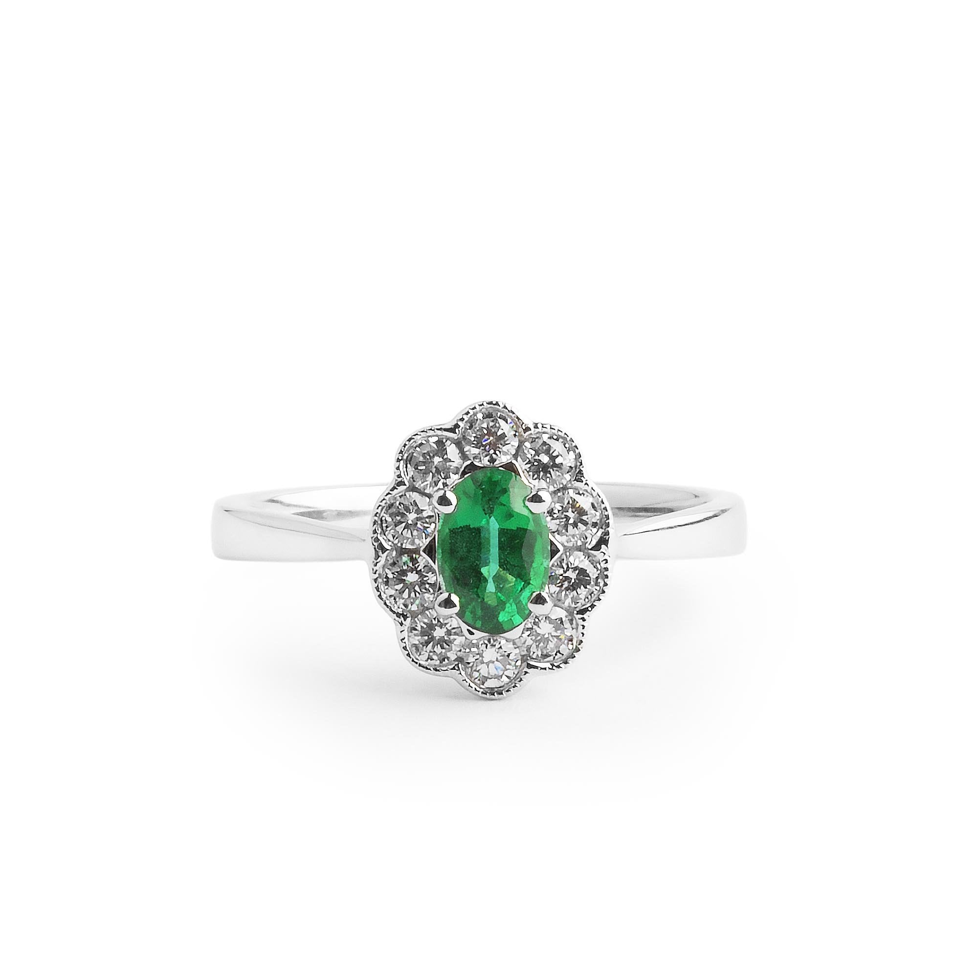 0.45ct Oval Emerald & 0.26ct Natural Diamond Cluster In 18ct White Gold