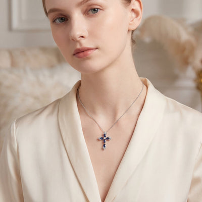0.47ct Sapphire and 0.16ct Diamond Cross Pendant in 18ct White Gold