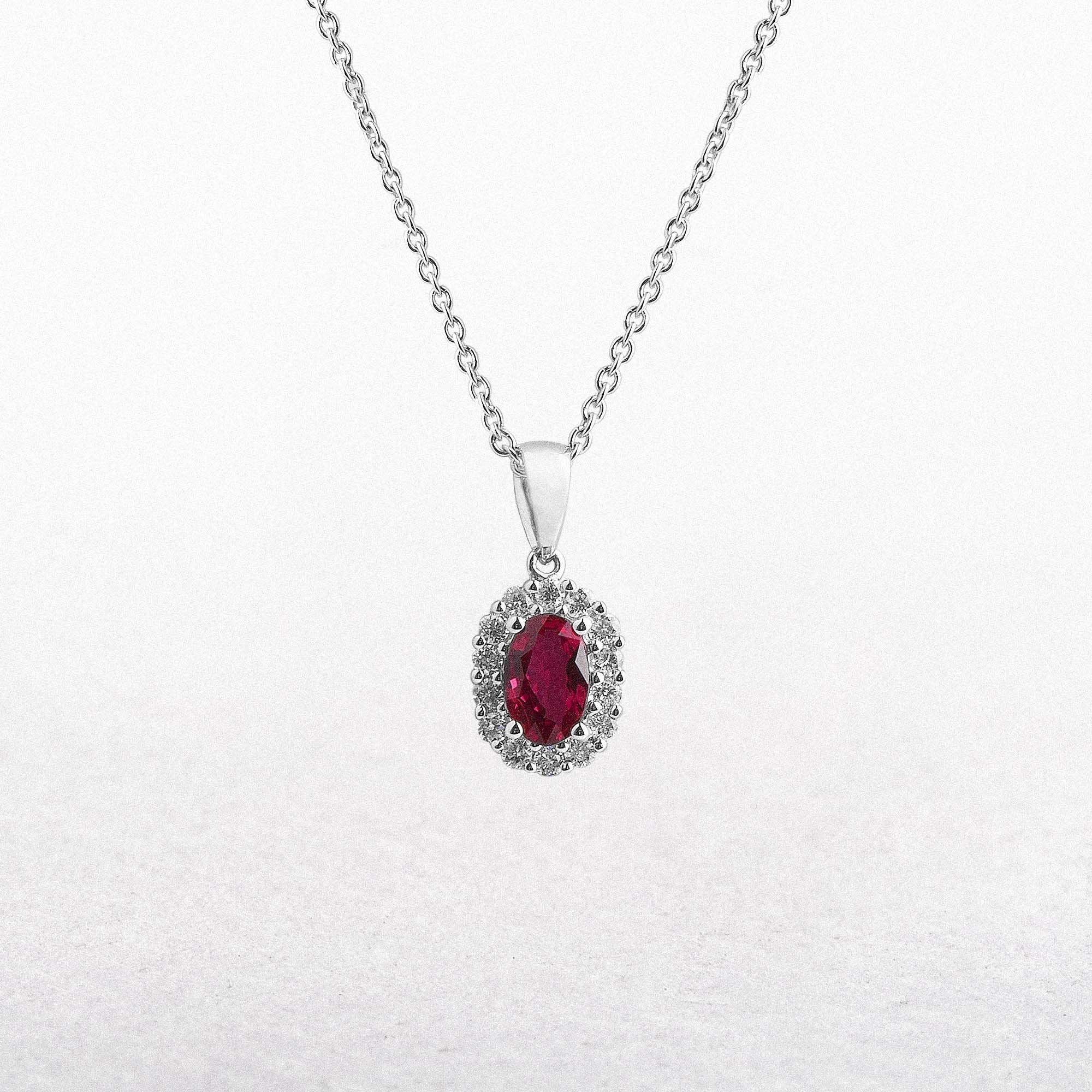 0.52ct Oval Ruby & 0.15ct Natural Diamond Halo Pendant in 18ct White Gold