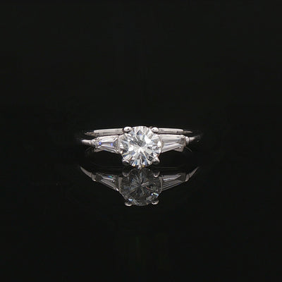 0.60ct F vs Round Brilliant Cut Natural Diamond Solitaire with Baguette Sides in Platinum