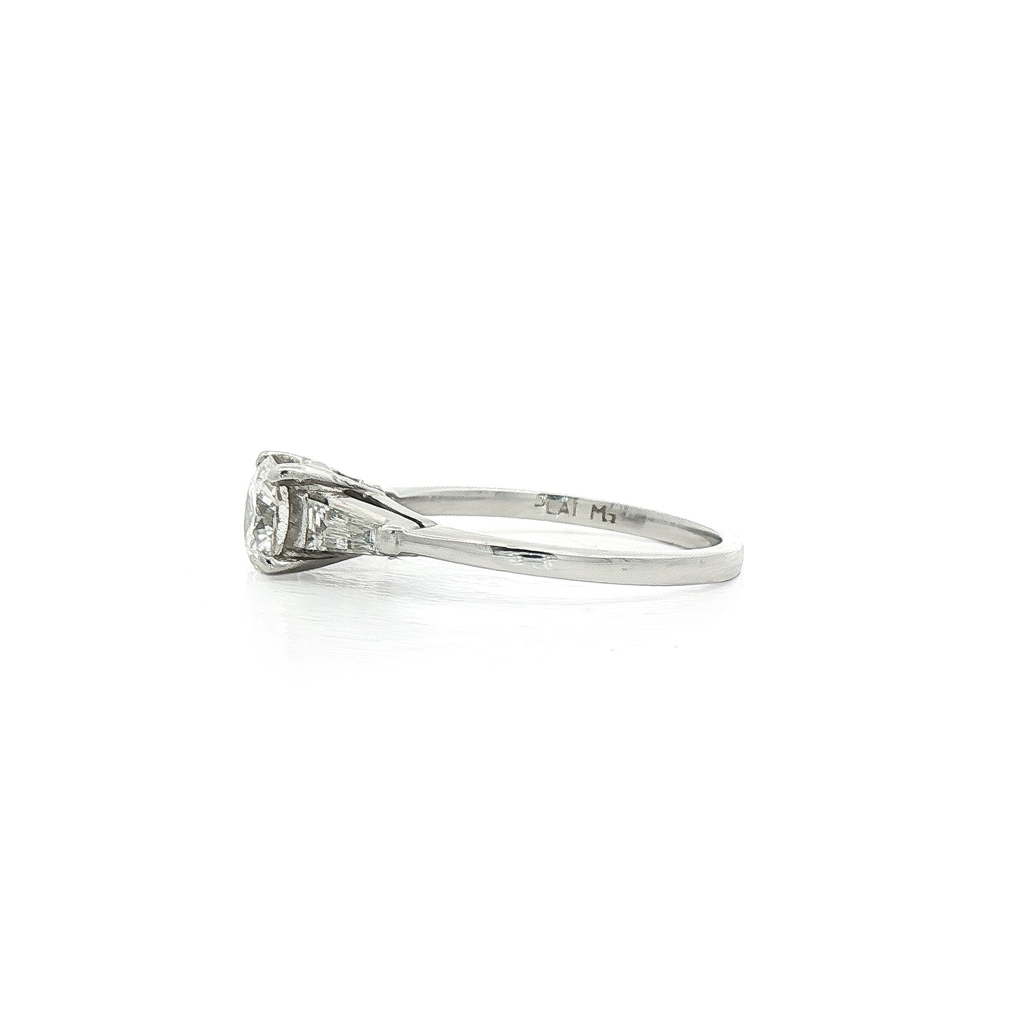 0.60ct F vs Round Brilliant Cut Natural Diamond Solitaire with Baguette Sides in Platinum