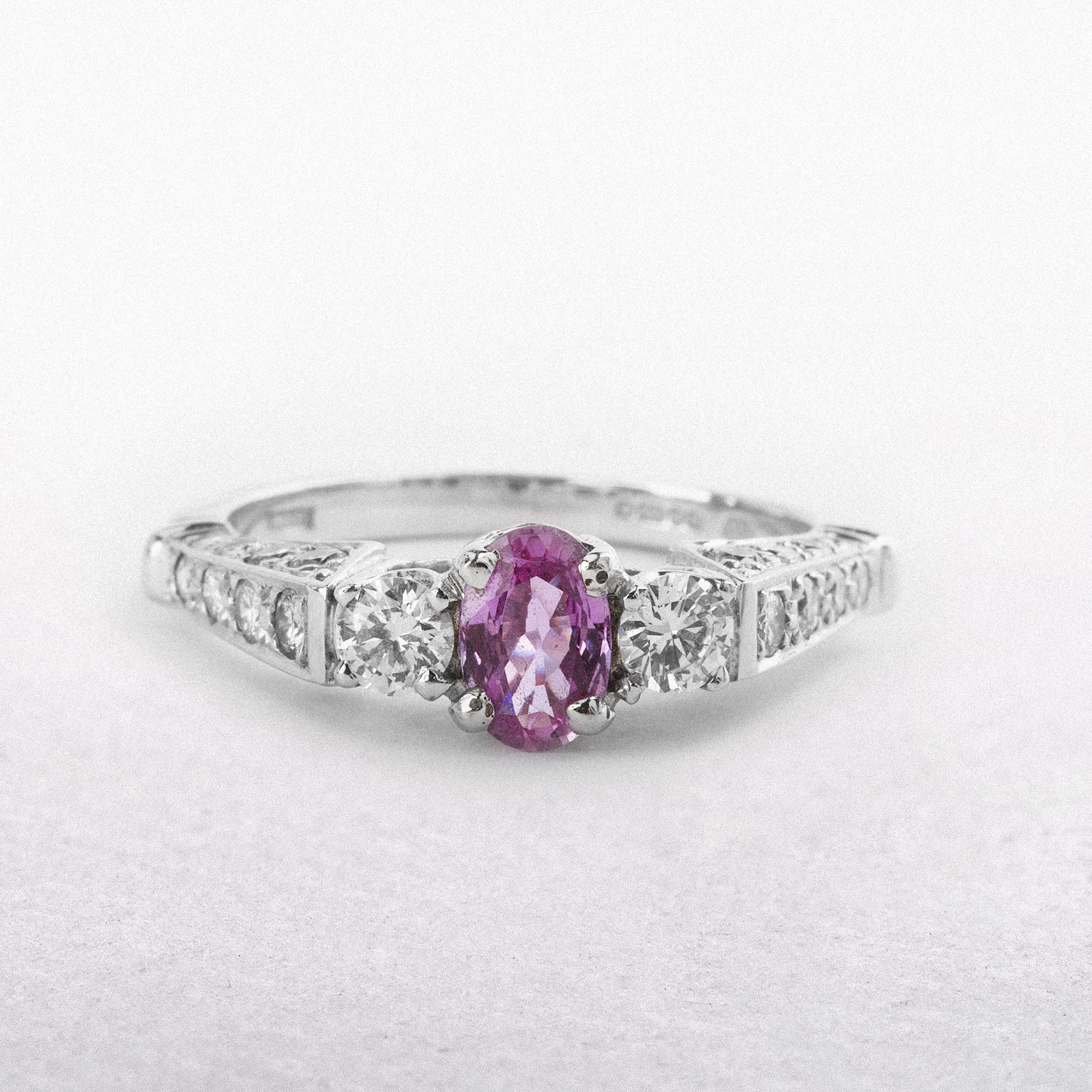0.61ct Pink Sapphire and 0.73ct Natural Diamond Dress Ring in 18ct White Gold