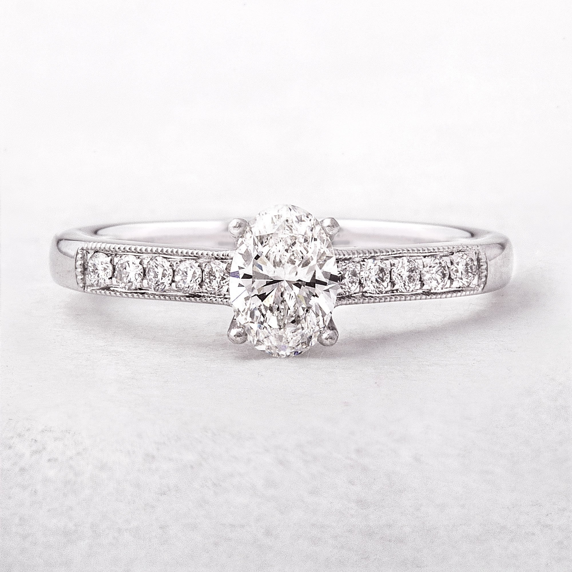 0.64ct F VS1 Oval Natural Diamond Solitaire with Diamond Shoulders 18ct White Gold Engagement Ring