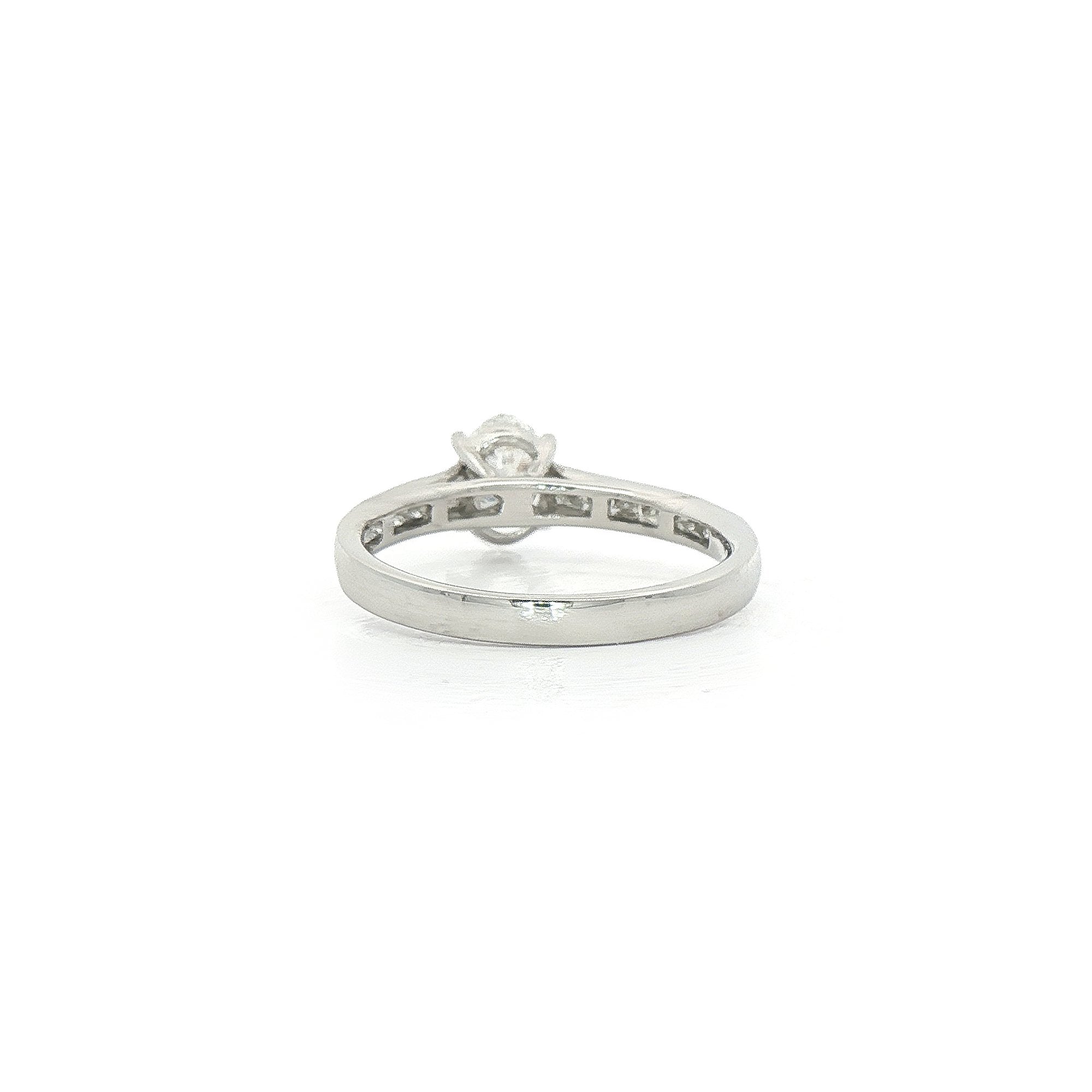 0.78ct D VS2 GIA Certified Oval Solitaire With Princess Cut Shoulders Platinum Engagement Ring
