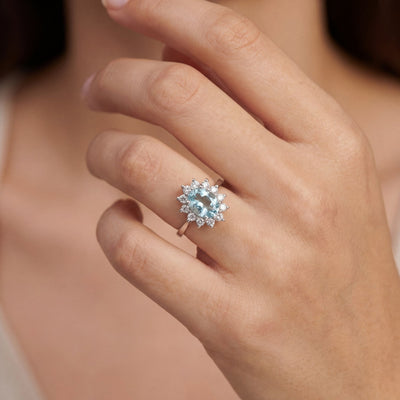 0.80ct Oval Aquamarine & 0.30ct Natural Diamond Cluster Ring in 18ct White Gold