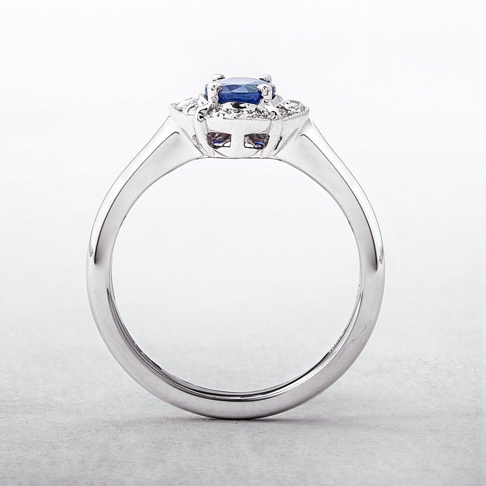 0.81ct Oval Sapphire & 0.15ct Natural Diamond Halo Cluster Ring in 18ct White Gold