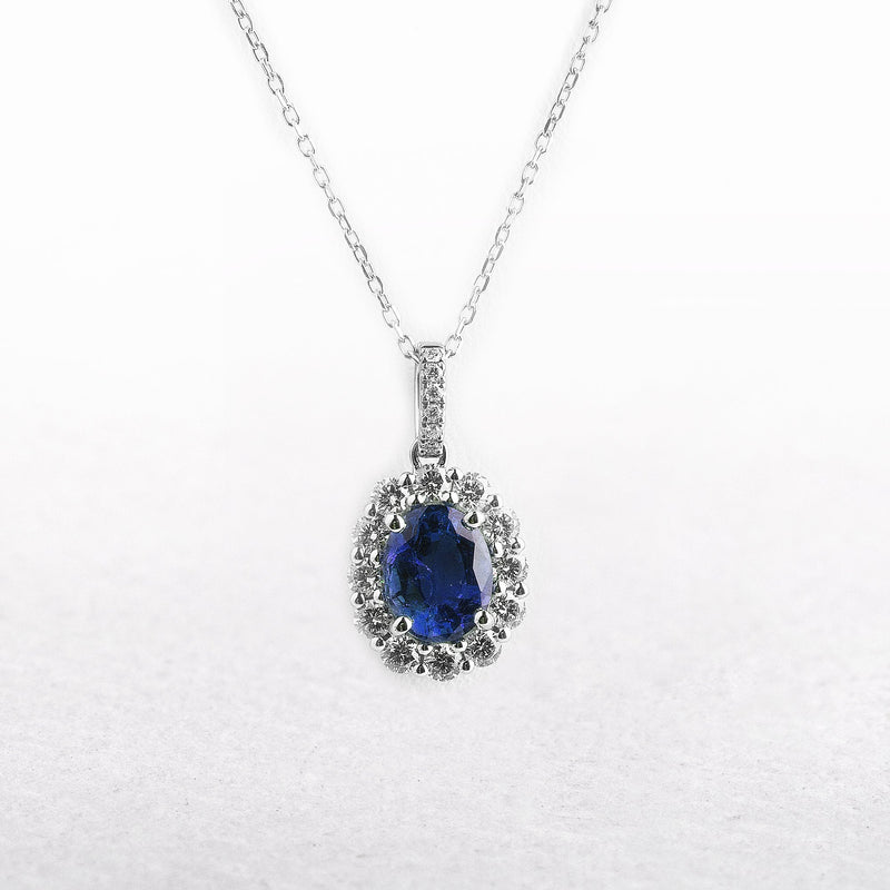 0.92ct Oval Sapphire & 0.39ct Natural Diamond Halo Pendant in 18ct White Gold