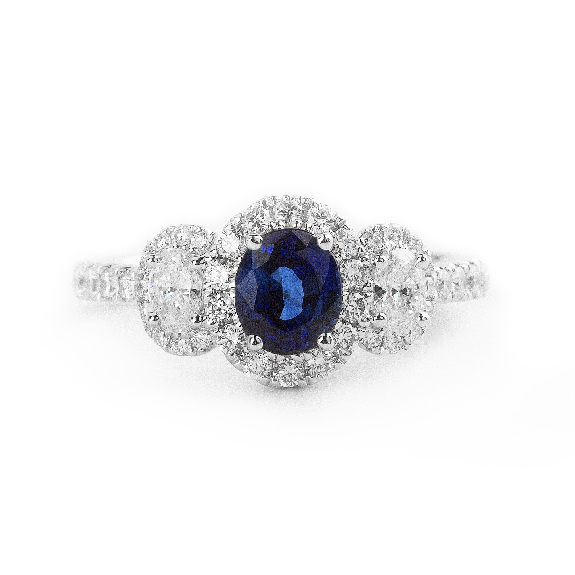 0.92ct Oval Sapphire & 0.65ct Natural Diamond Halo Three Stone in 18ct White Gold