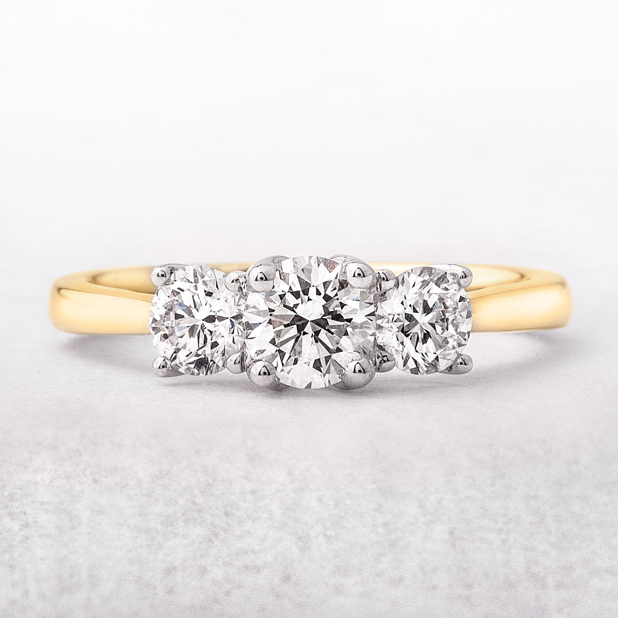 0.95ct F-G VS Natural Round Cut Diamond Three Stone, 18ct Gold Engagement Ring