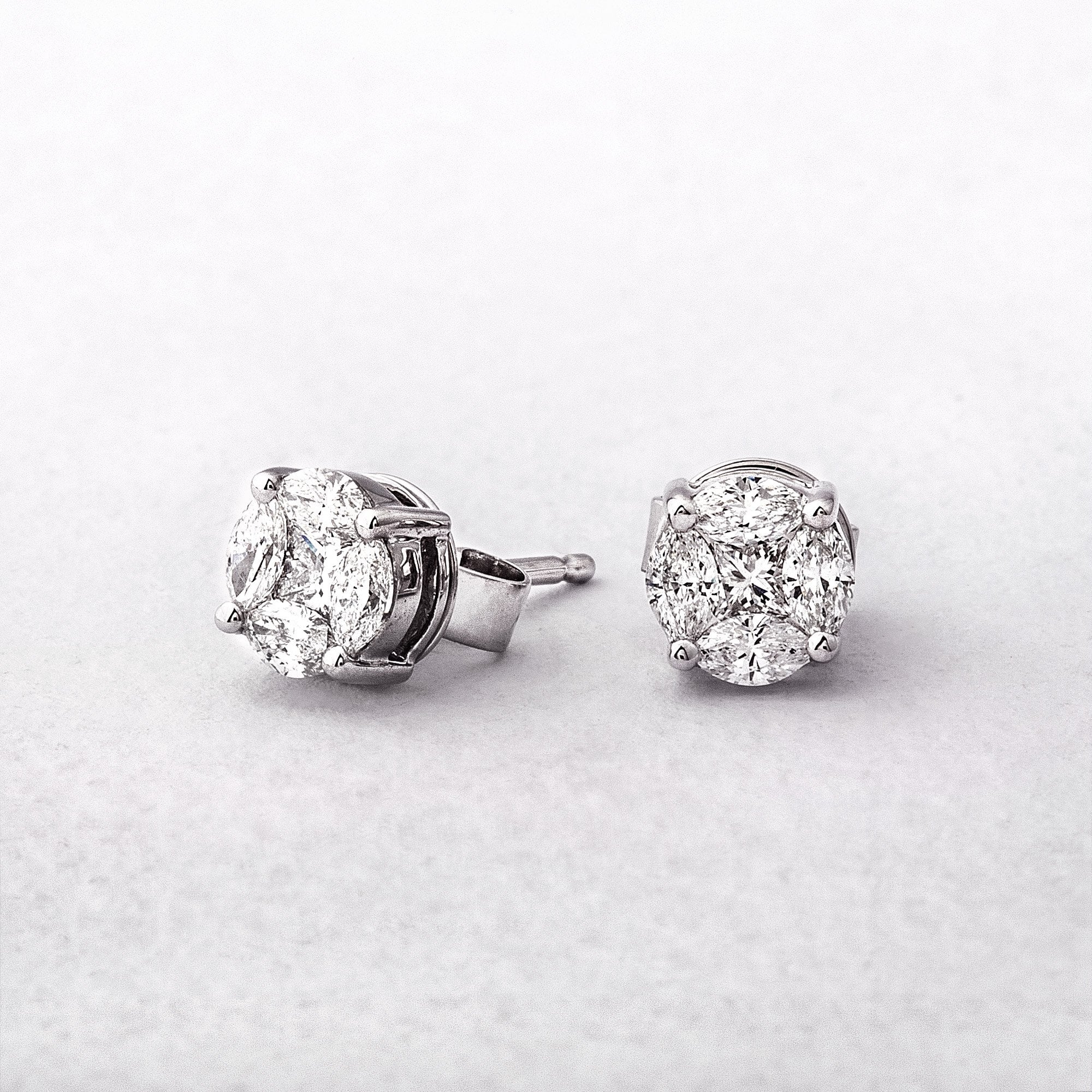 0.Natural Diamond 6.3mm Round Invisible Set Stud Earrings in 18ct White Gold