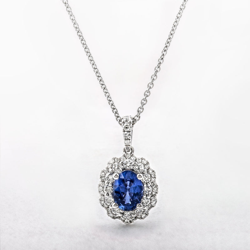 1.02ct Oval Cut Sapphire and 0.40ct Diamond Pendant in 18ct White Gold