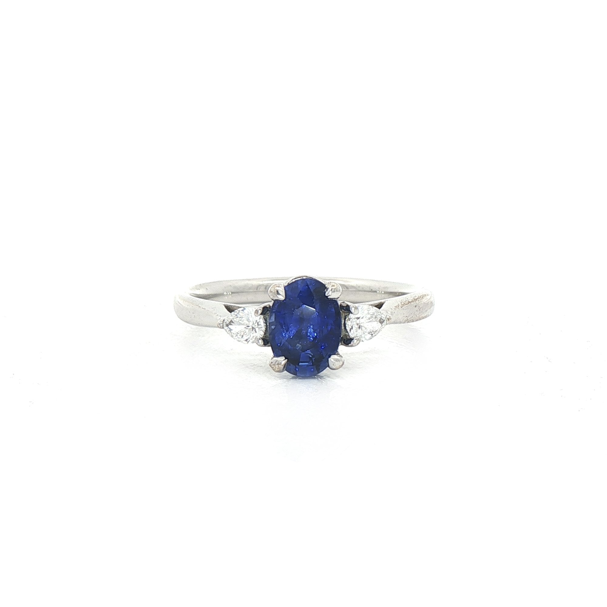 1.05ct Oval Sapphire & Natural Diamond 0.20ct with Pear Side Diamonds in 18ct White Gold