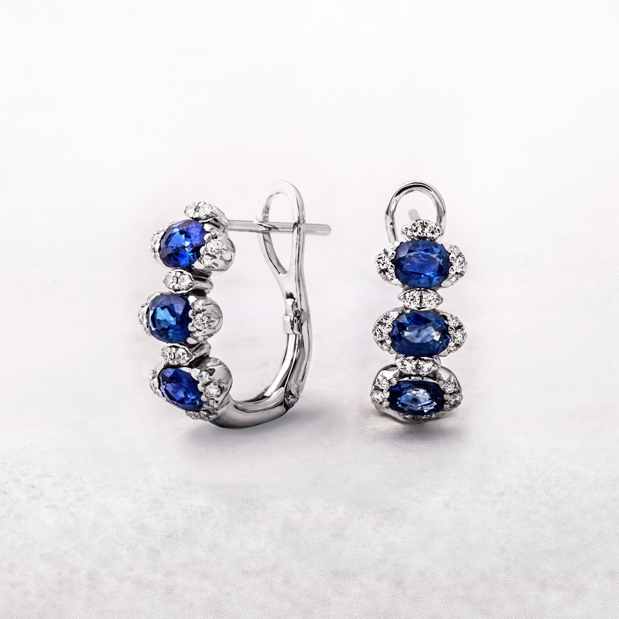 1.17ct Oval Sapphire and 0.16ct Diamond Cuff Earrings in 18ct Gold