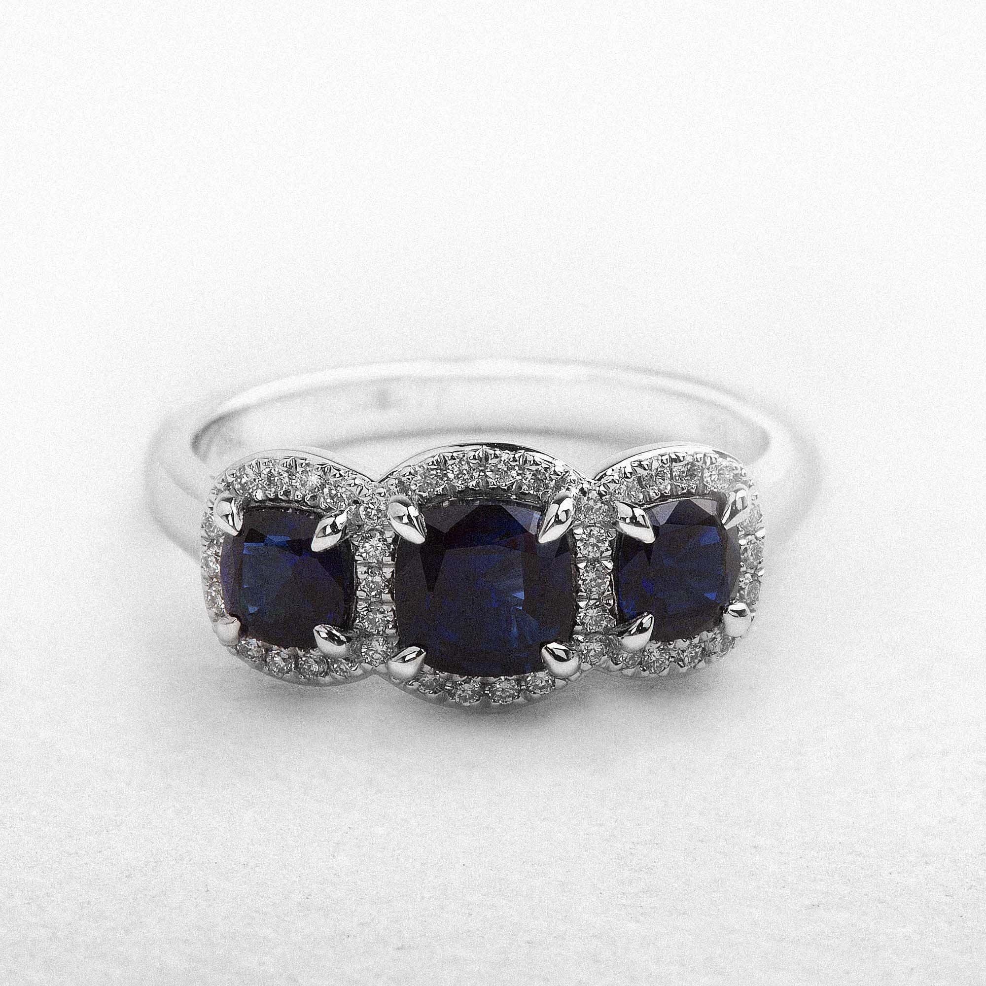 1.47ct Sapphire & Natural Diamond Three Stone Halo in 18ct White Gold