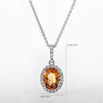 1.55ct Oval Citrine & 0.20ct Natural Diamond Halo Pendant in 18ct White Gold