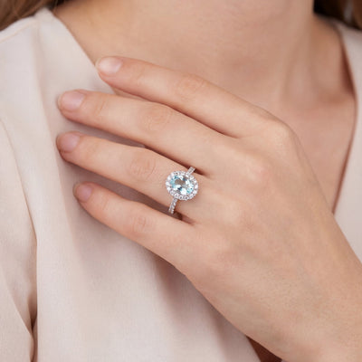 1.56ct Oval Blue Topaz & 0.57ct Natural Diamond Halo with Shoulders in 18ct White Gold