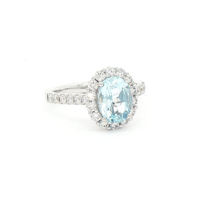1.56ct Oval Blue Topaz & 0.57ct Natural Diamond Halo with Shoulders in 18ct White Gold
