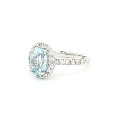 1.56ct Oval Blue Topaz & 0.57ct Natural Diamond Halo with Shoulders in 18ct White Gold