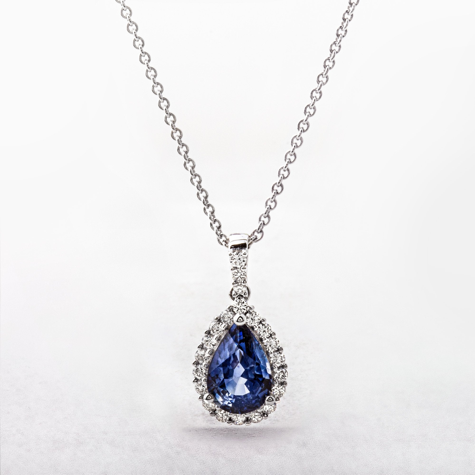 1.57ct Pear Cut Sapphire & 0.25ct Diamond Pendant in 18ct White Gold