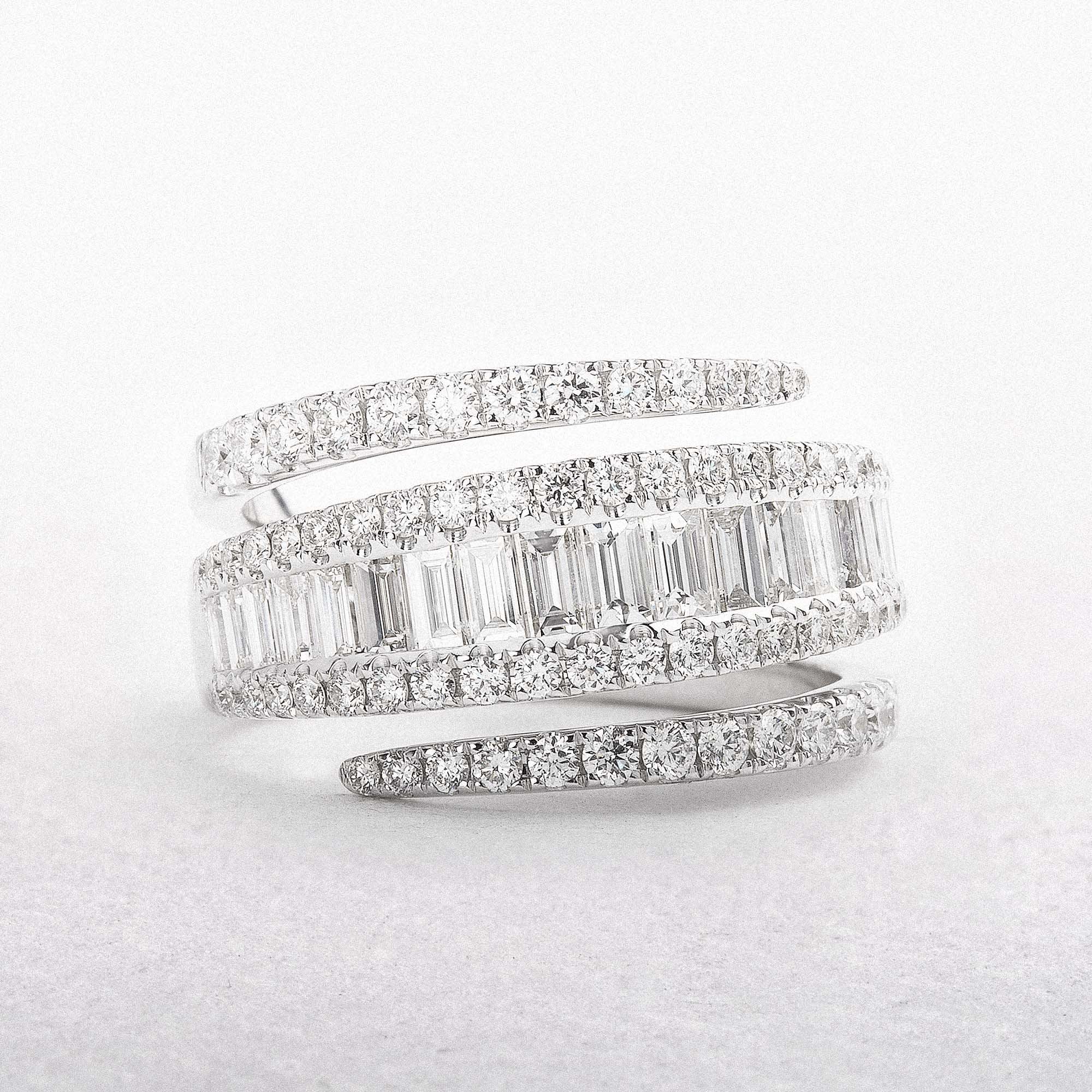 1.67ct Natural Diamond Brilliant And Baguette Cut Cross Over Diamond Ring Set In 18ct White Gold