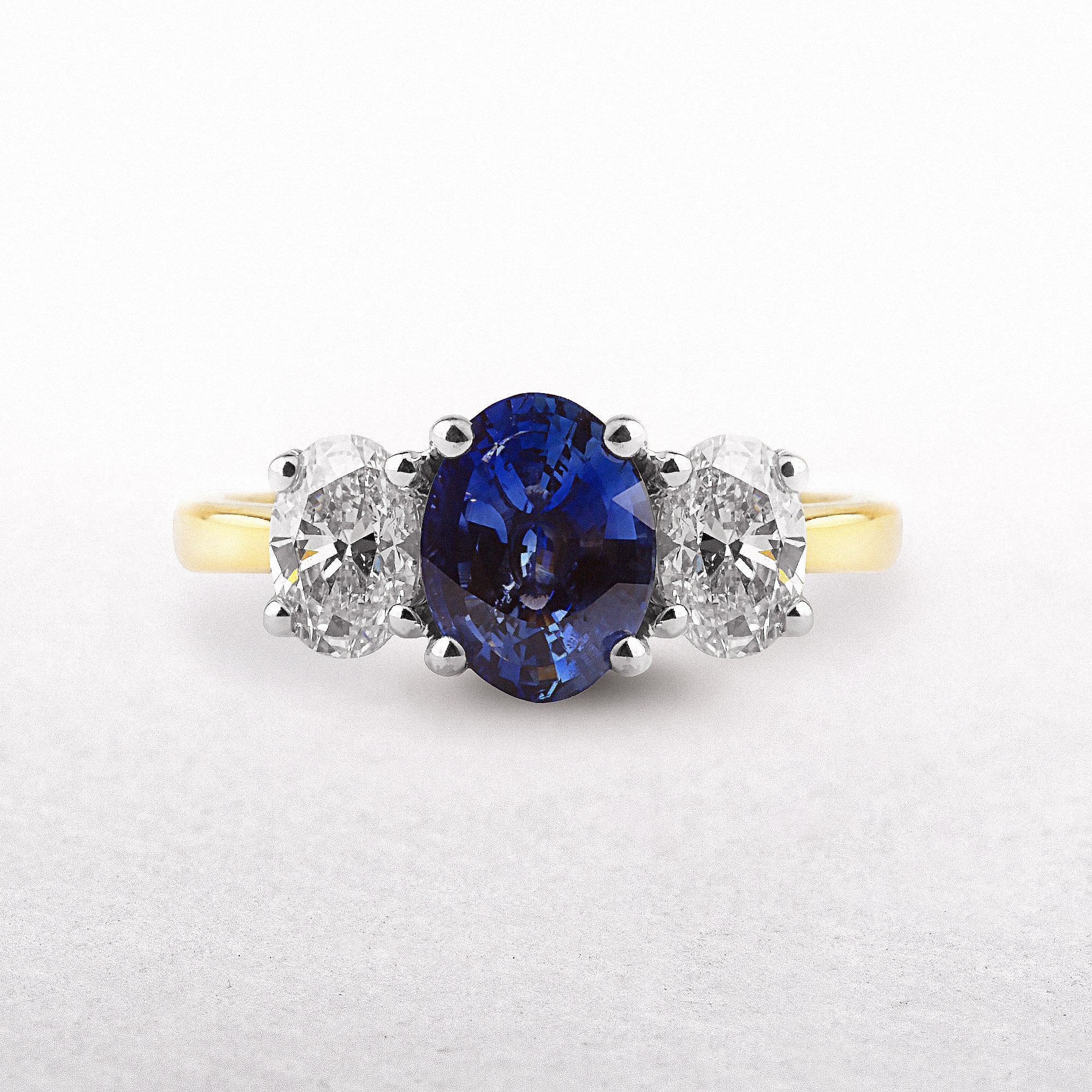 1.67ct Oval Sapphire & Natural Diamond 1ct Three Stone in 18ct Yellow Gold