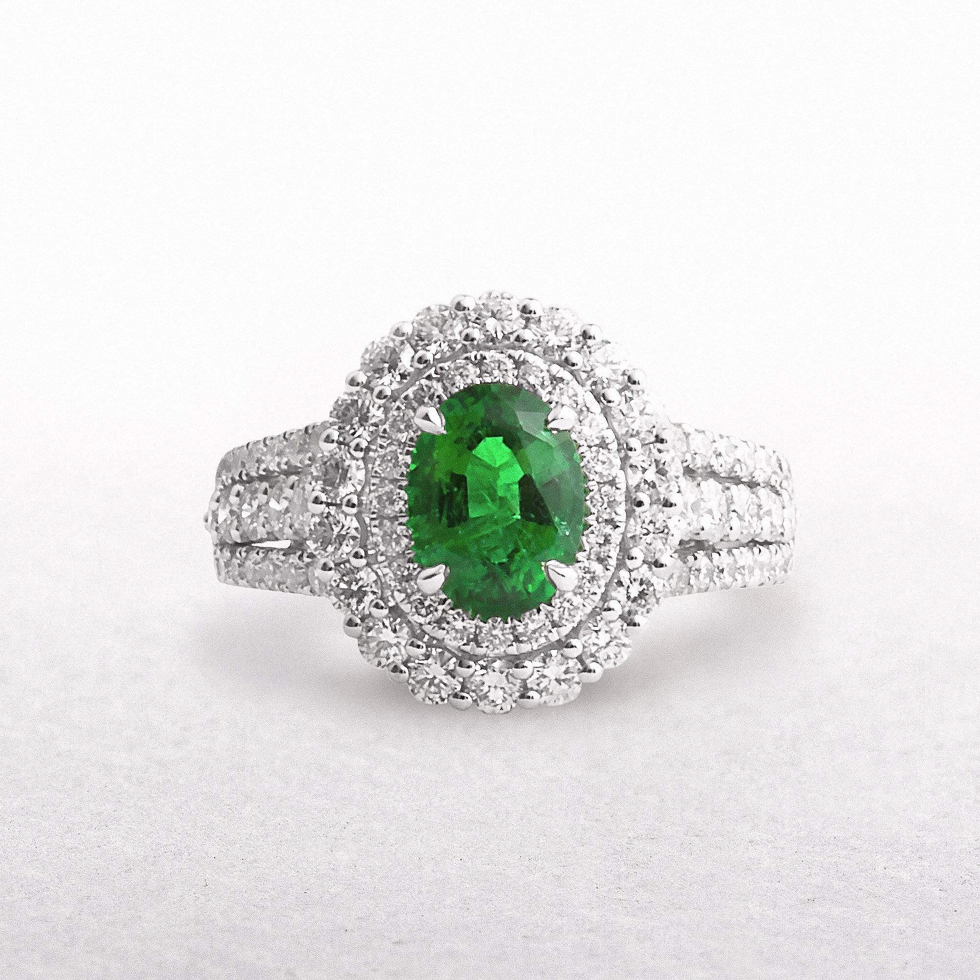 18ct White Gold Oval Emerald & Natural Diamond Halo Ring
