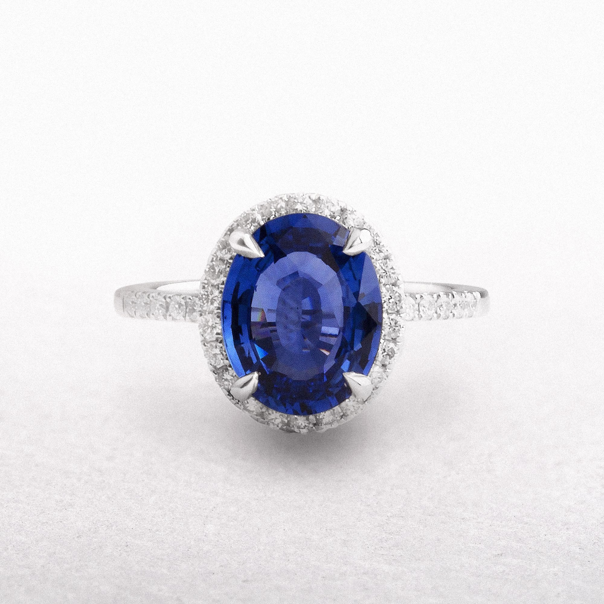 18ct White Gold Oval Sapphire & Natural Diamond Cluster Ring