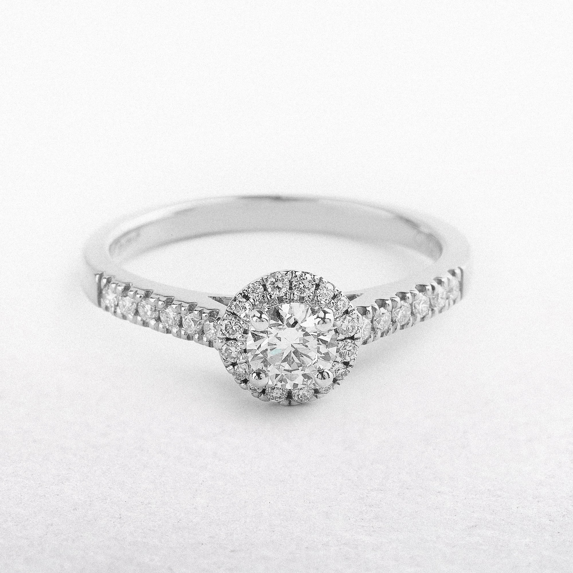 18ct White Gold Round Brilliant Halo and Diamond Shoulders