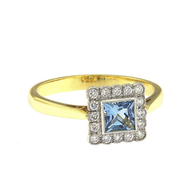 18ct Y/G and Plat Sq Aqua 0.44 and Diamond 0.20 Clust ring