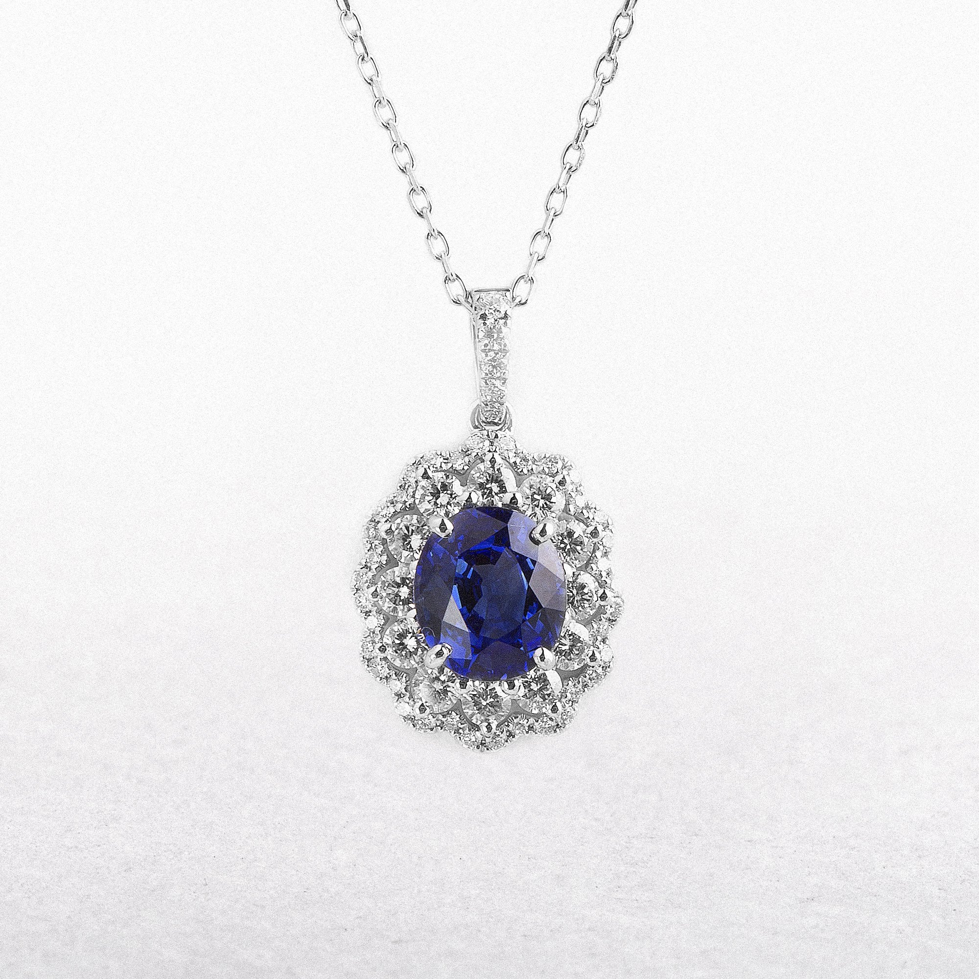 2.06ct Oval Sapphire & 0.77ct Natural Diamond Pendant in 18ct White Gold