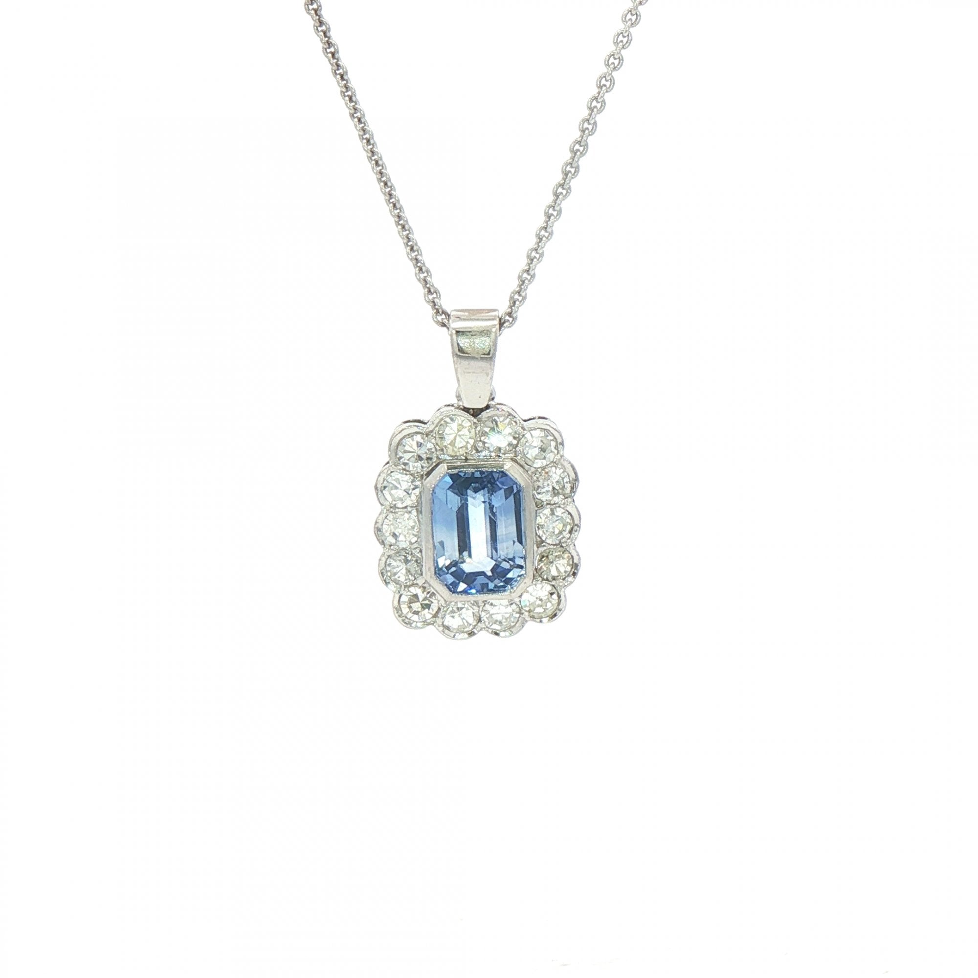 2.13ct Cushion Cut Blue Sapphire & 0.75ct Natural Diamond Halo Rub Over Setting in 18ct White Gold