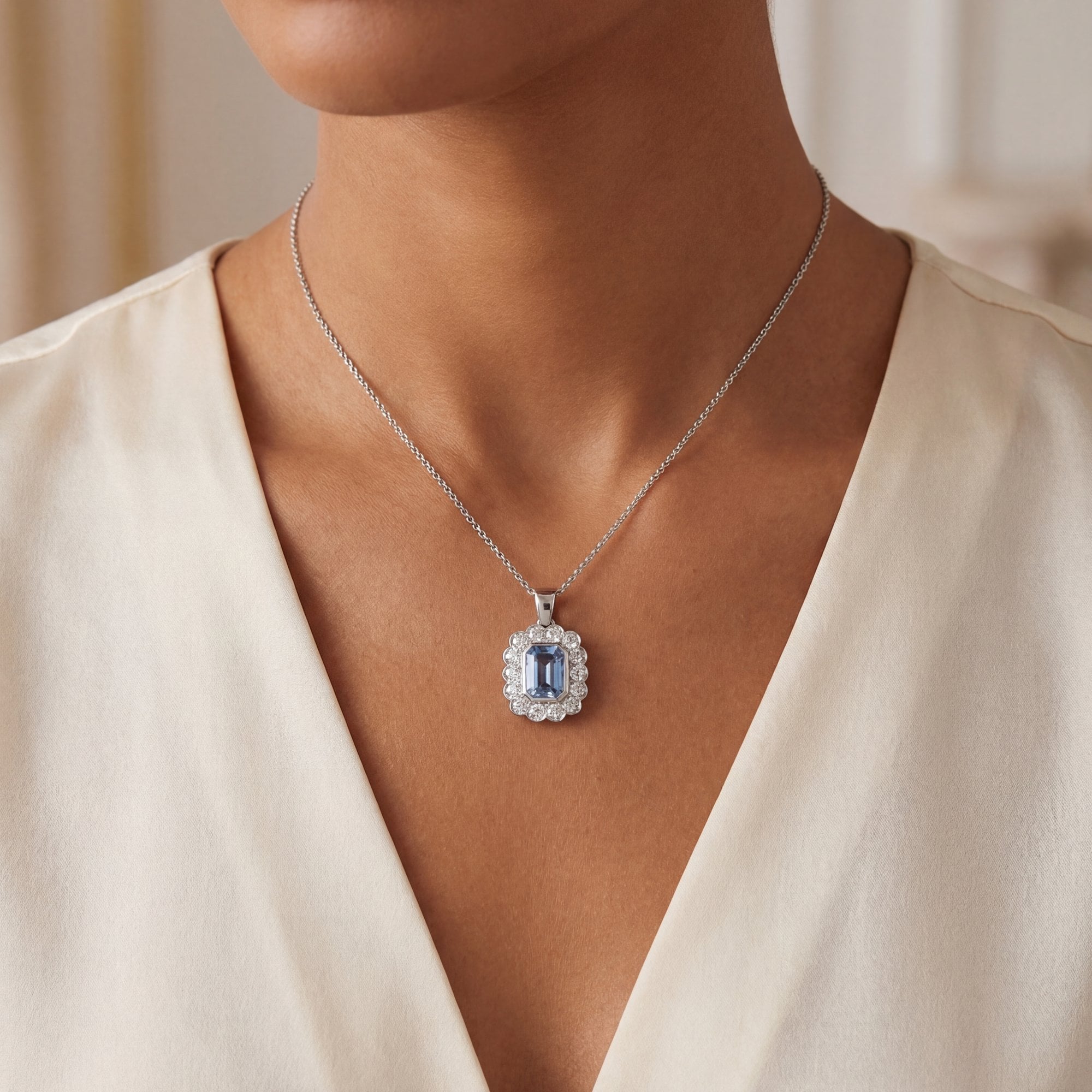 2.13ct Cushion Cut Blue Sapphire & 0.75ct Natural Diamond Halo Rub Over Setting in 18ct White Gold