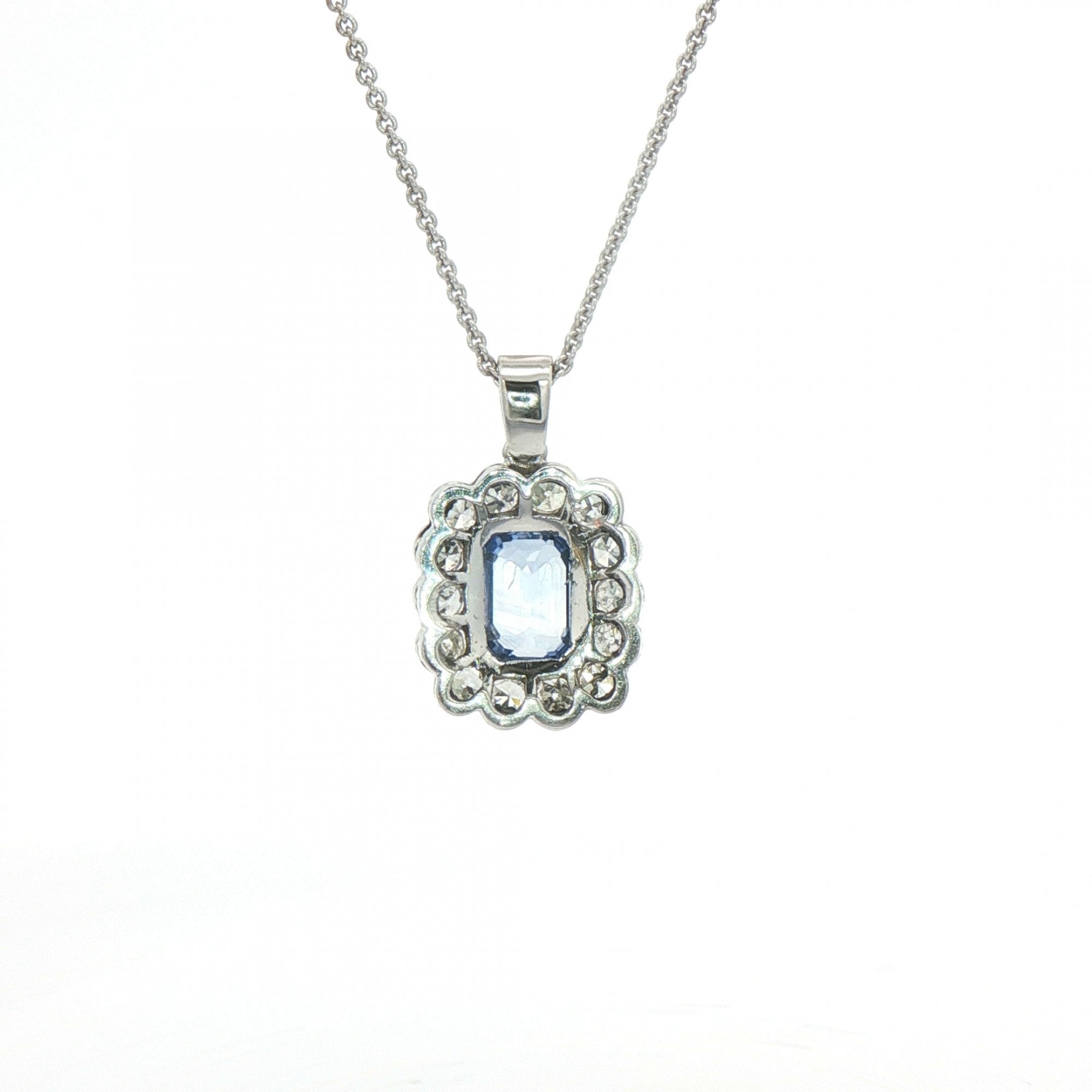 2.13ct Cushion Cut Blue Sapphire & 0.75ct Natural Diamond Halo Rub Over Setting in 18ct White Gold