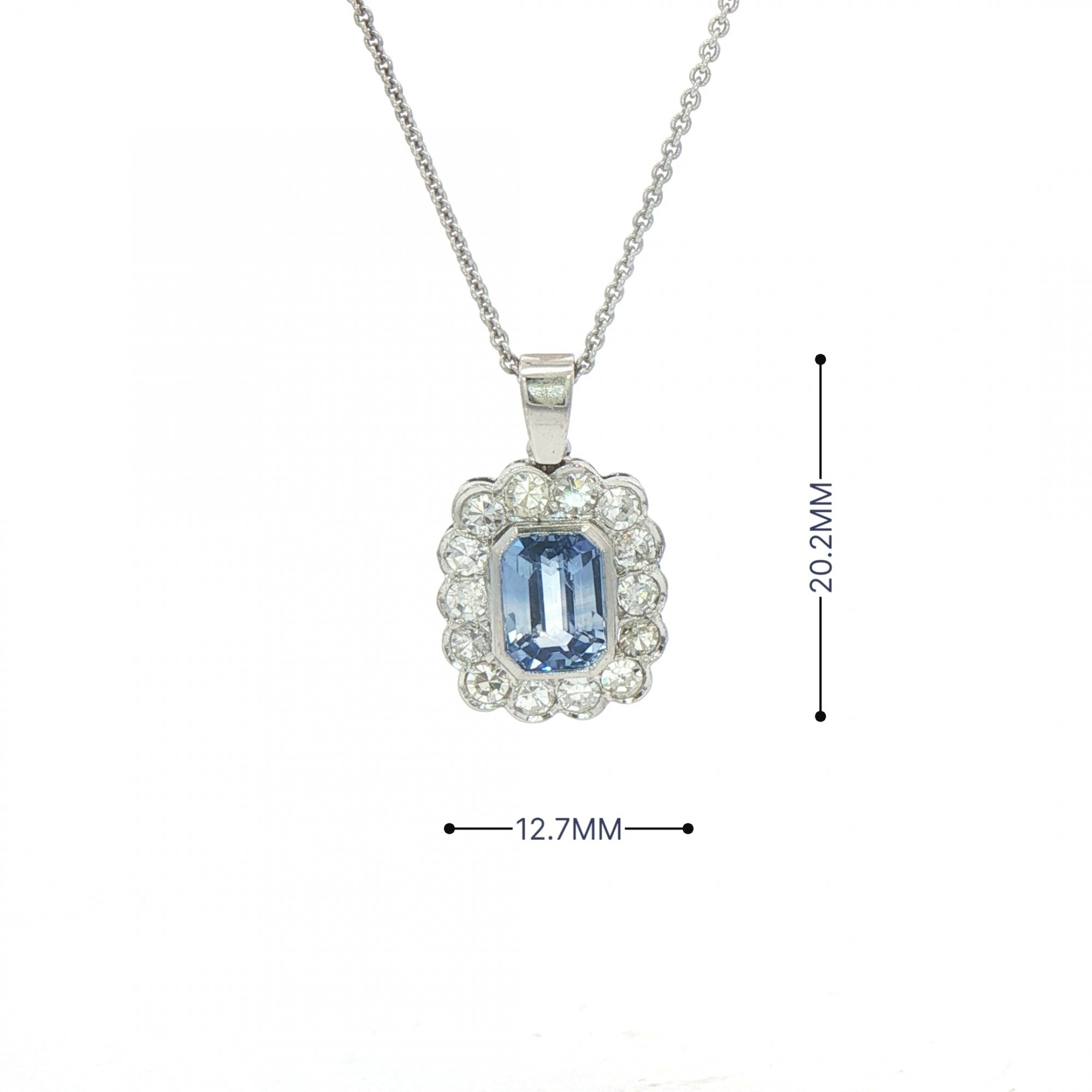 2.13ct Cushion Cut Blue Sapphire & 0.75ct Natural Diamond Halo Rub Over Setting in 18ct White Gold