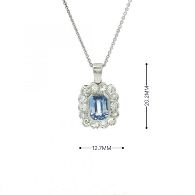 2.13ct Cushion Cut Blue Sapphire & 0.75ct Natural Diamond Halo Rub Over Setting in 18ct White Gold
