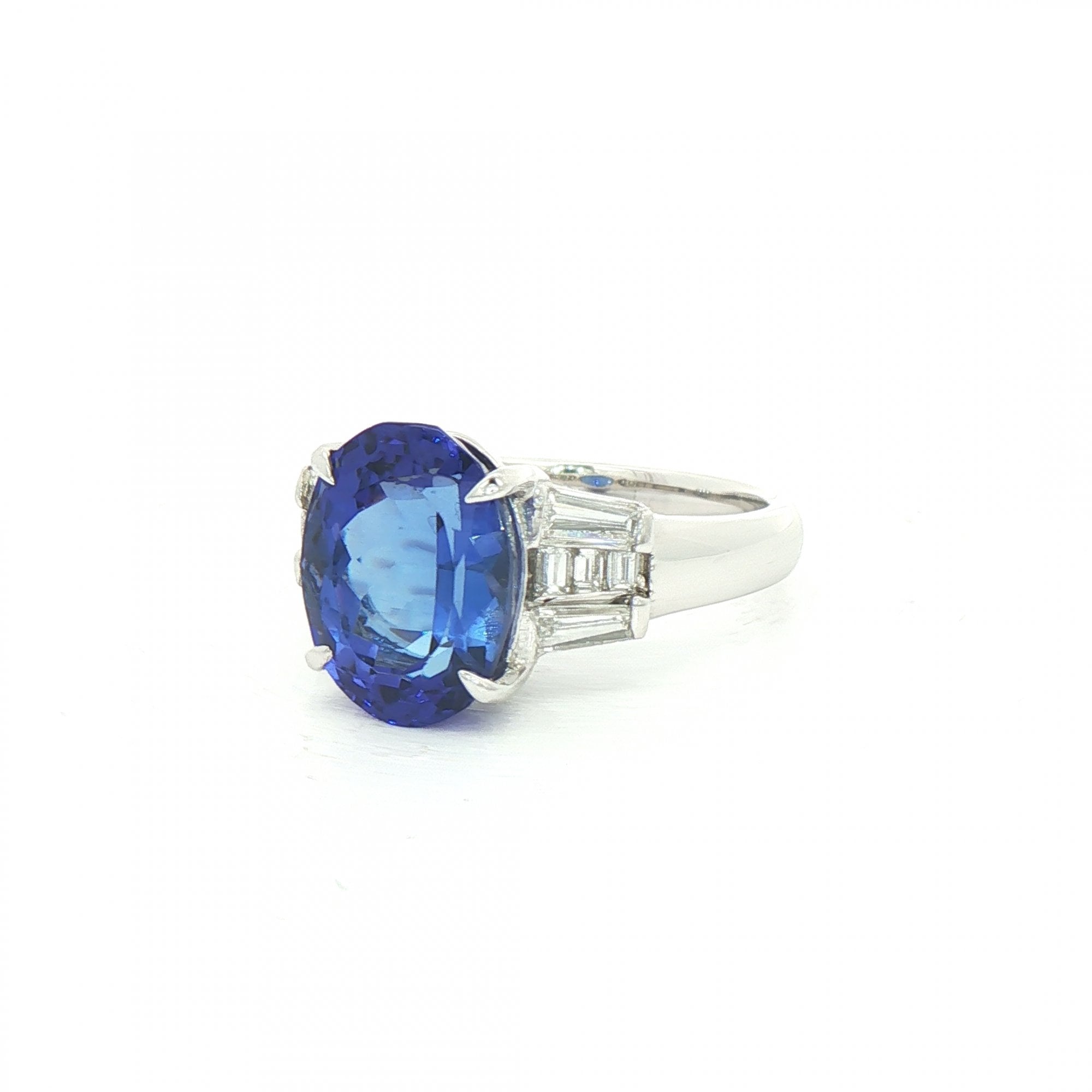 4.88ct Oval Tanzanite & 0.51ct Natural Diamond Dress Ring in Platinum