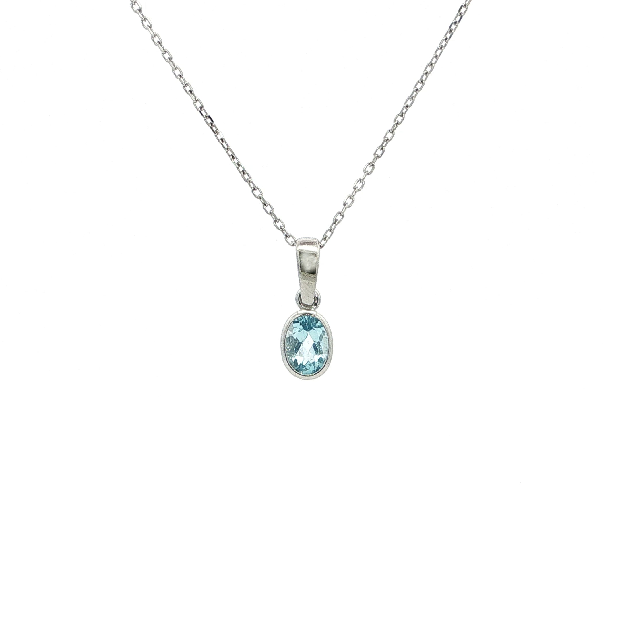 Oval Blue Topaz Pendant in 9ct White Gold
