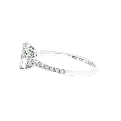 0.75ct Oval Cluster Solitaire Ring With Diamond Shoulders Set In 18ct White Gold