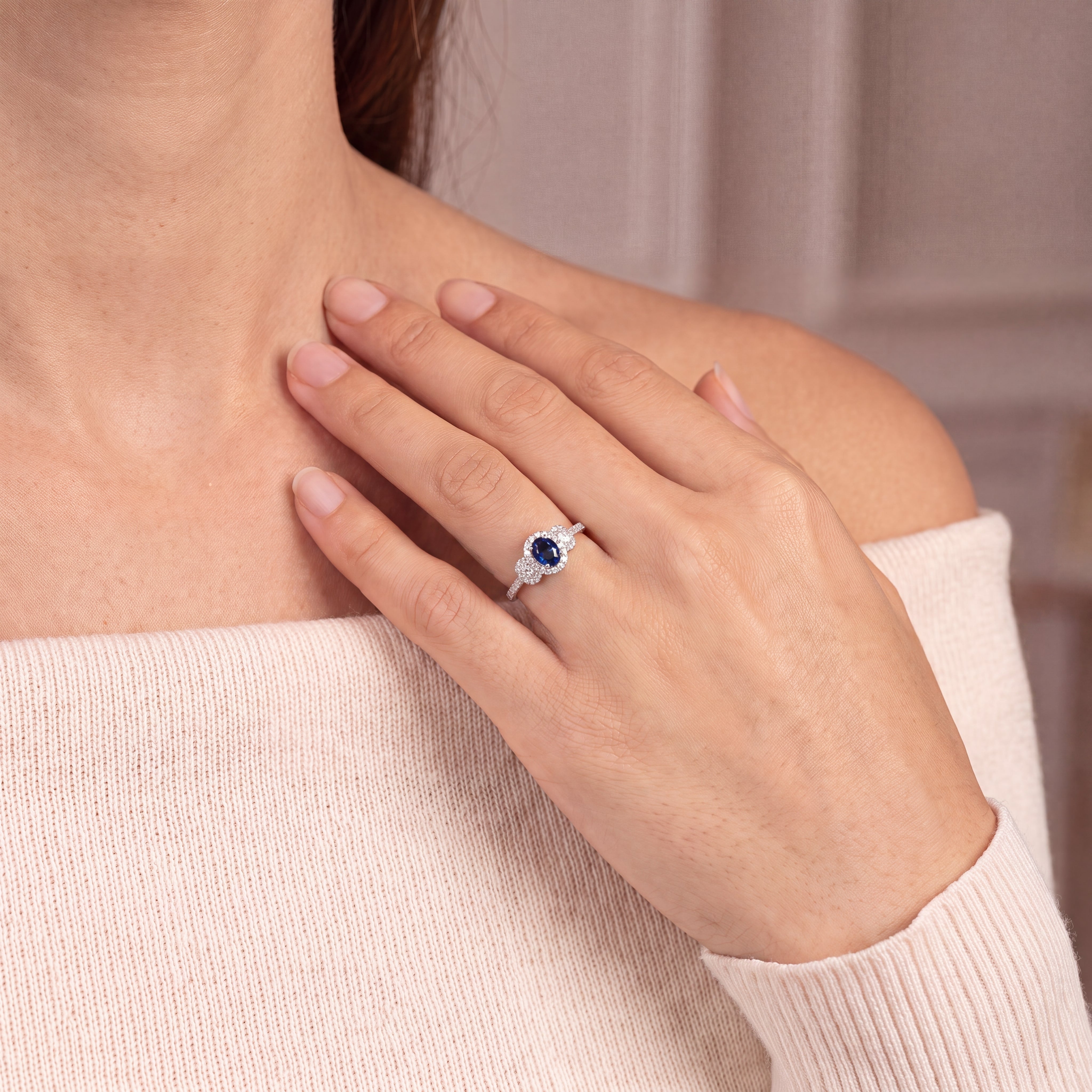 0.92ct Oval Sapphire & 0.65ct Natural Diamond Halo Three Stone in 18ct White Gold