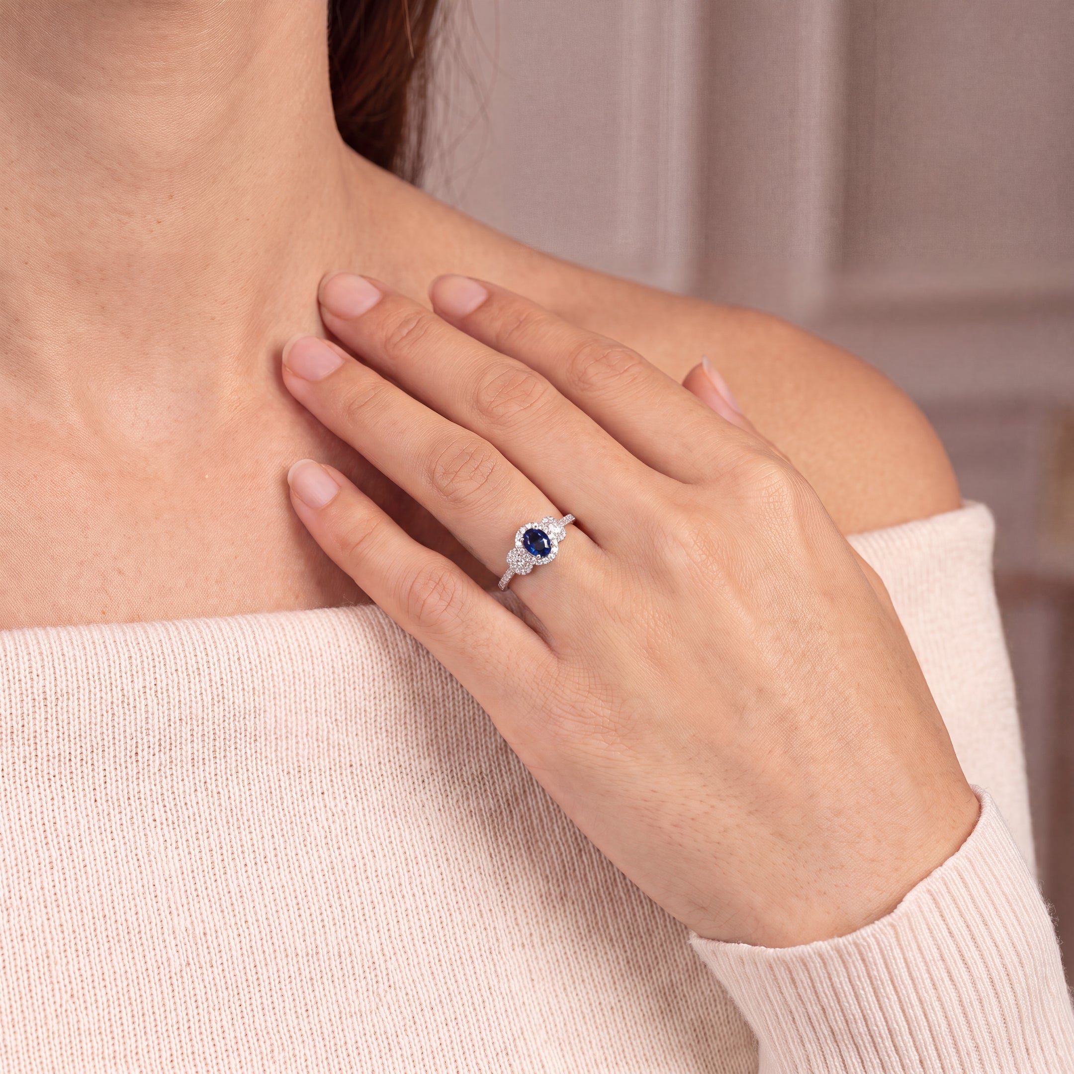 0.92ct Oval Sapphire & 0.65ct Natural Diamond Halo Three Stone in 18ct White Gold