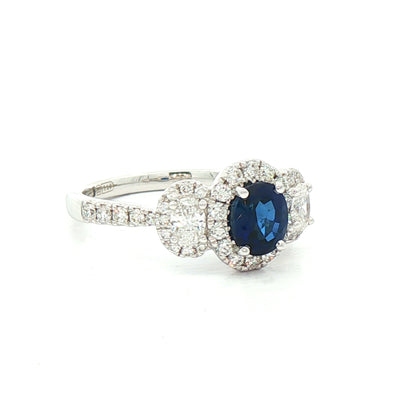 0.92ct Oval Sapphire & 0.65ct Natural Diamond Halo Three Stone in 18ct White Gold