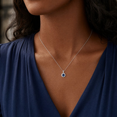 0.81ct Sapphire & 0.26ct Natural Diamond Curving Multistone Pendant in 18ct White Gold