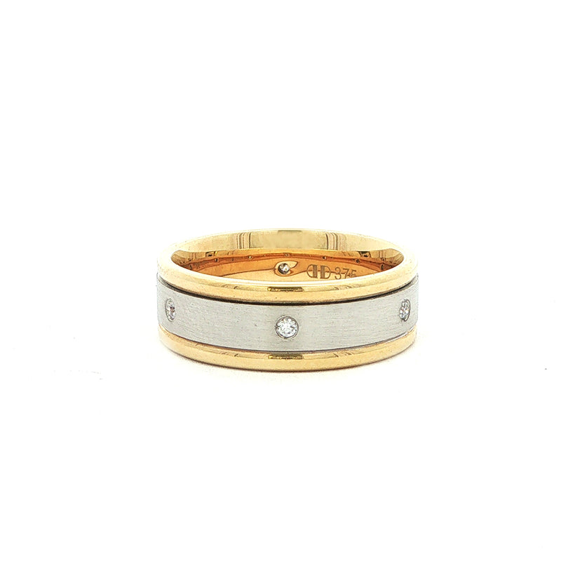 .09ct Round Brilliant cut Natural Diamond set two tone with a 9ct white gold satin center